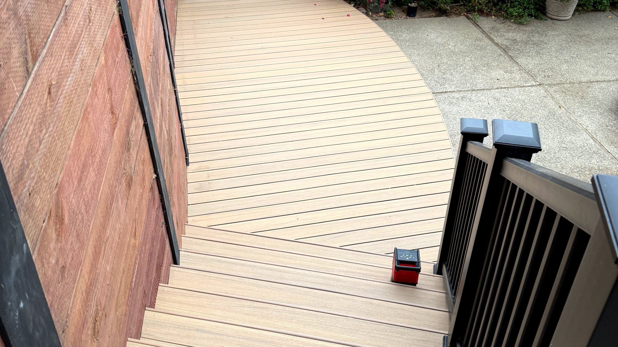 TimberTech Prime+ Coconut Husk stairs with black aluminum railing in Brisbane, CA