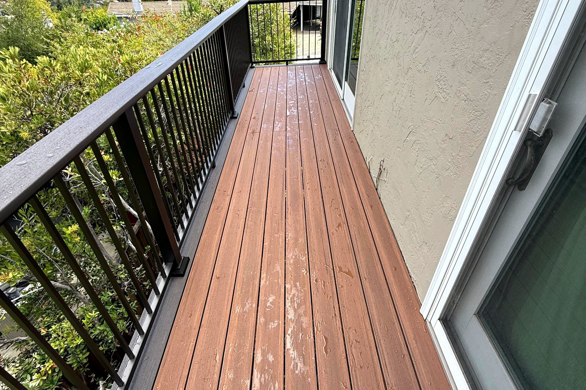 Narrow section of a composite deck along the house in Los Altos, CA