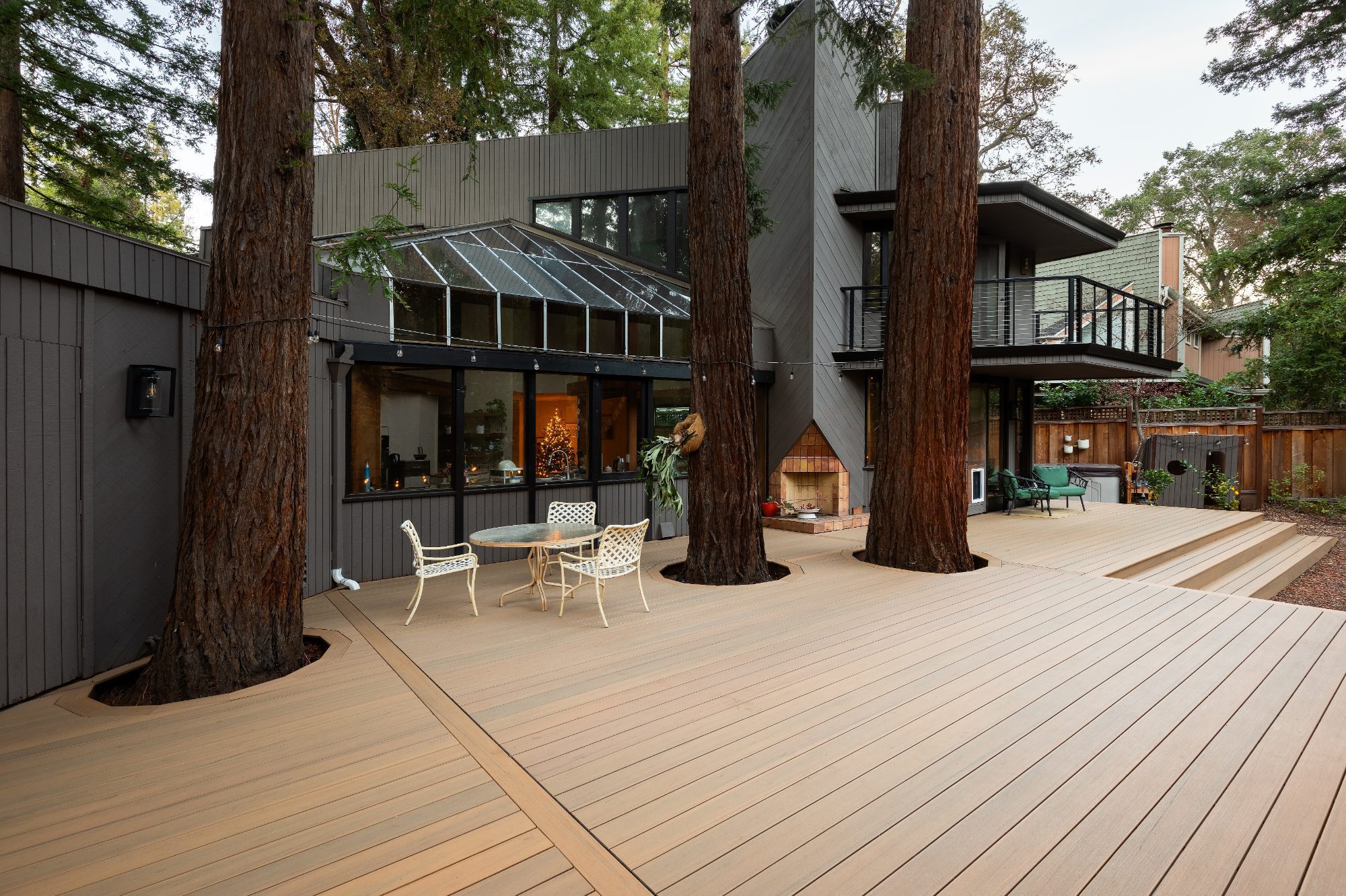 TimberTech Prime+ Coconut Husk deck built around mature trees in Menlo Park, CA