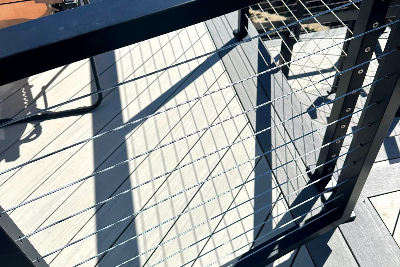 Composite deck with black cable railing in South San Francisco, CA