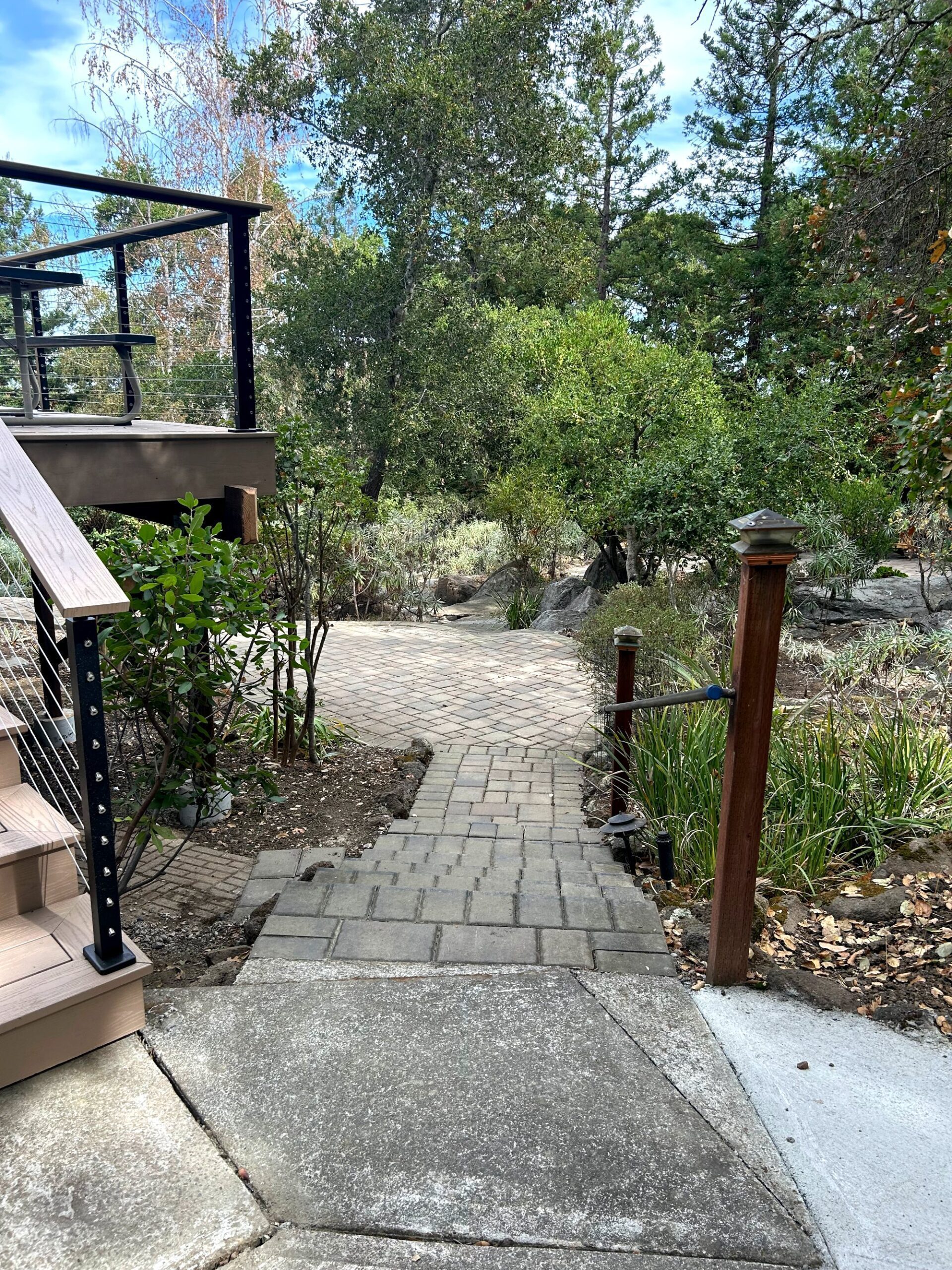 Cable railing and stairs on a composite deck in Woodside, CA