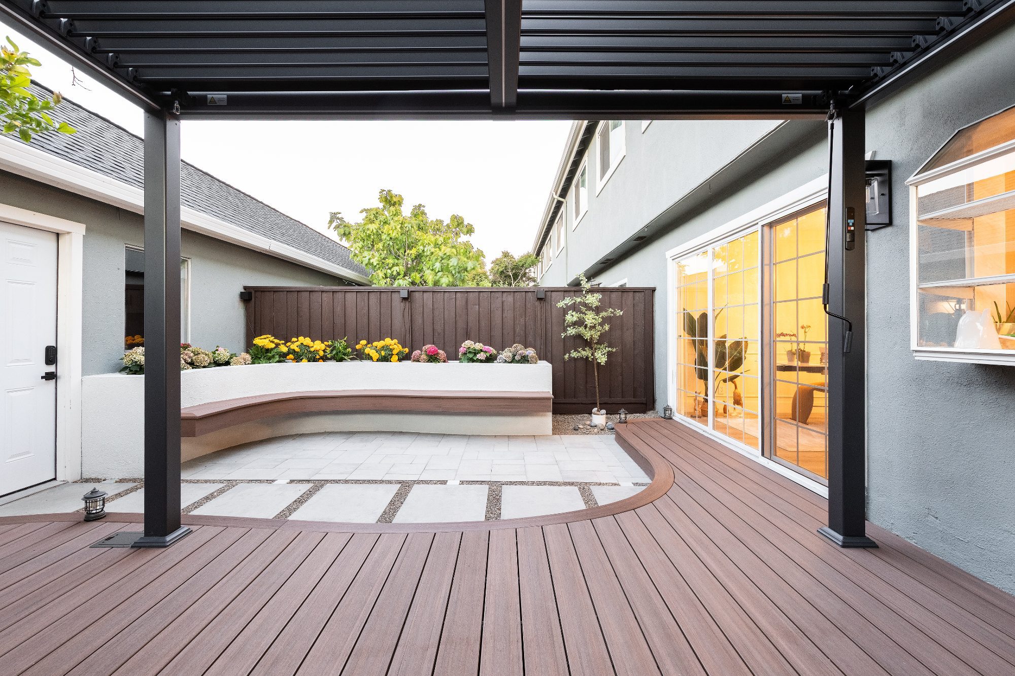 TimberTech Vintage English Walnut deck with Belgard pavers in Foster City, CA
