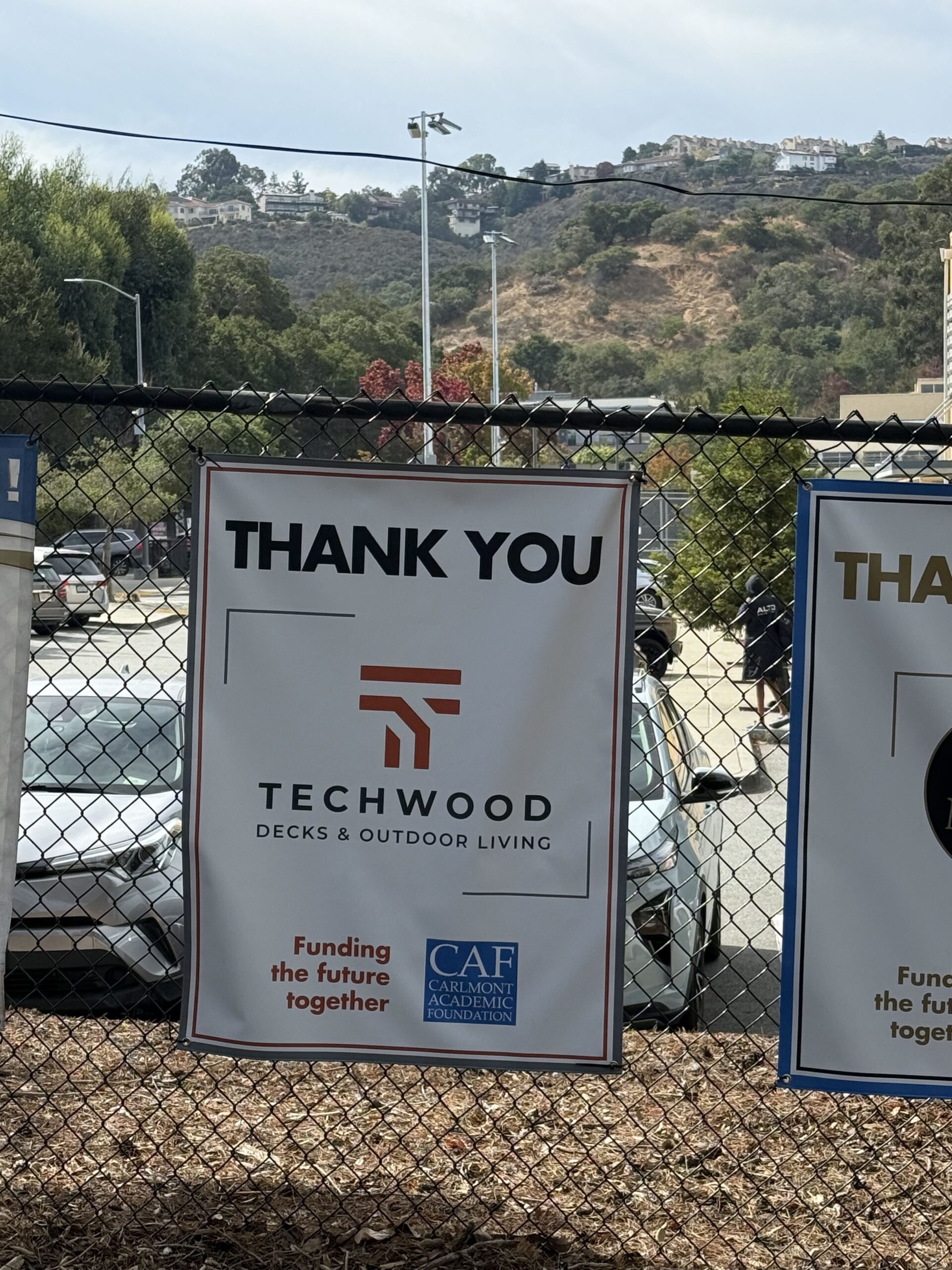 Thank you banner with the Techwood Decks logo at Carlmont High School in Belmont