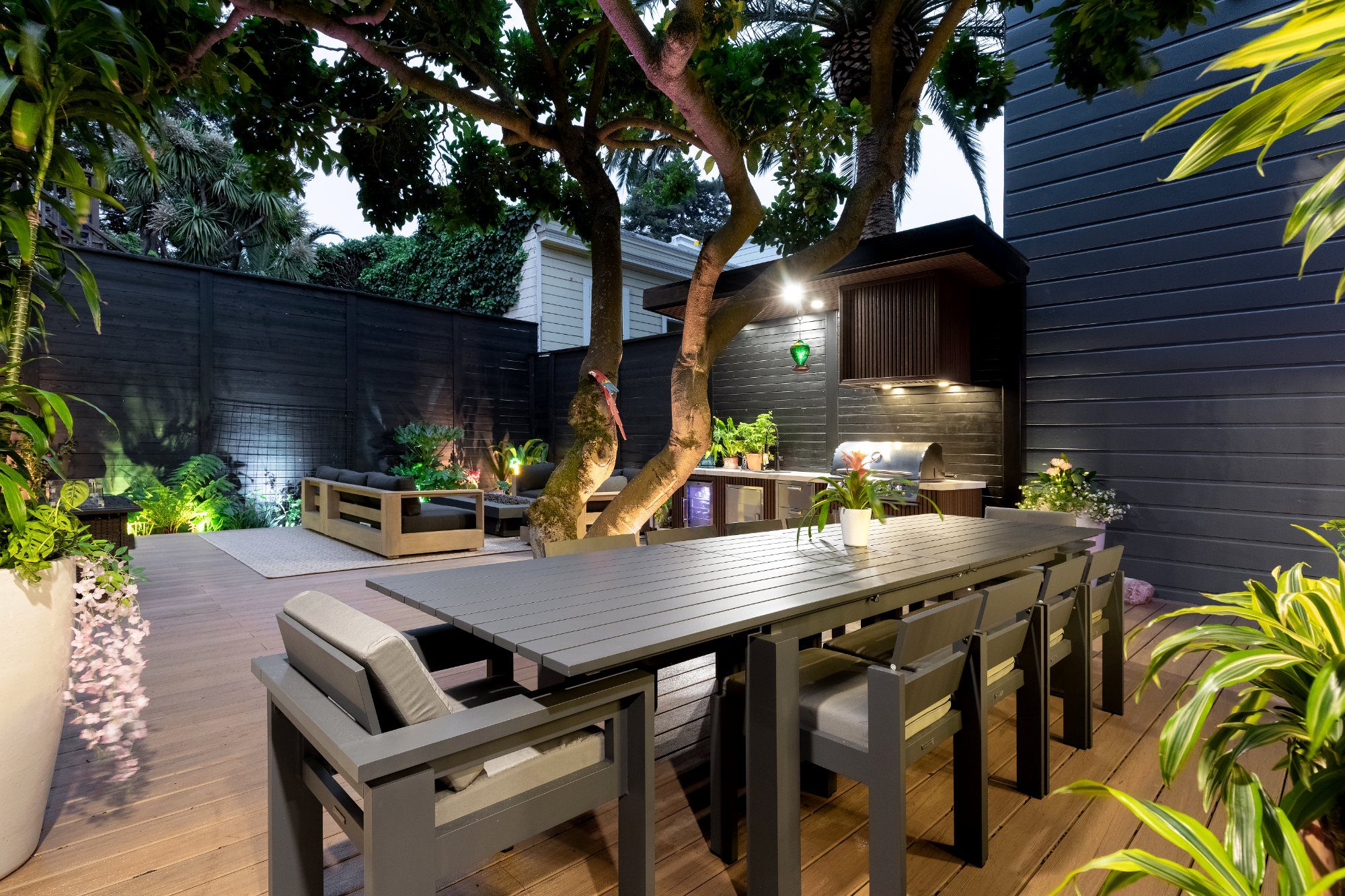 Outdoor dining area on a composite deck under a tree in San Francisco, CA