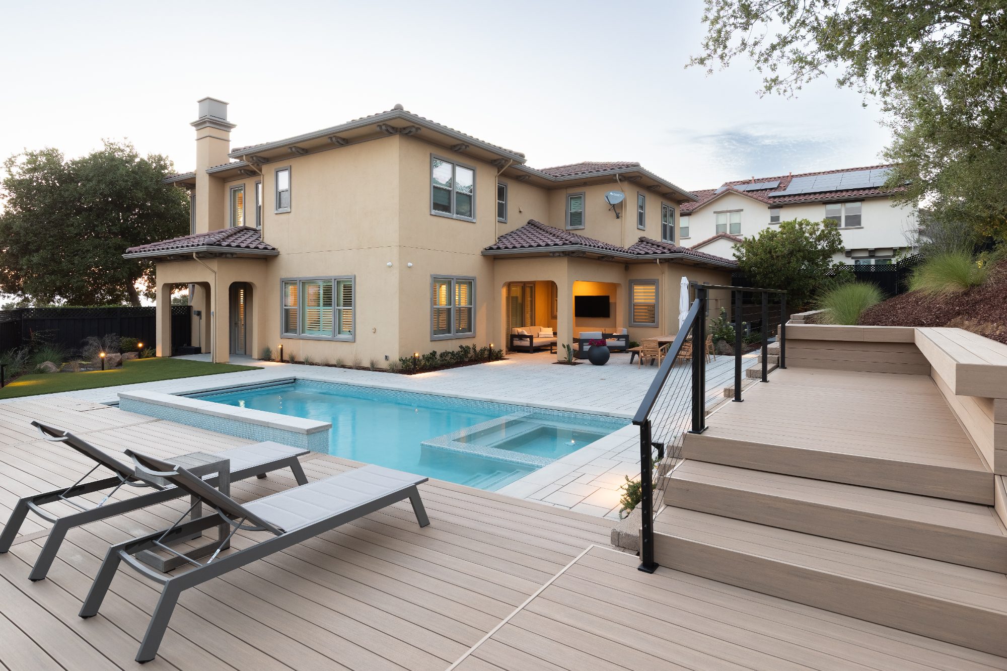 TimberTech deck with steps next to a pool in San Jose, CA